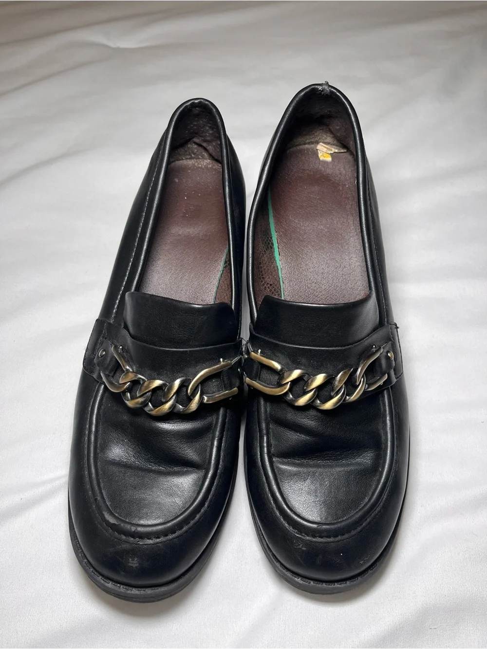 Black Leather Loafers with Gold Chain Accent
